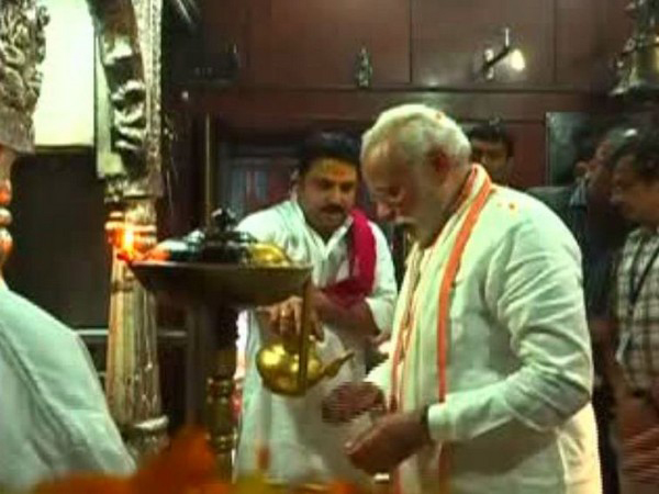 Prime Minister Narendra Modi is offering prayer 