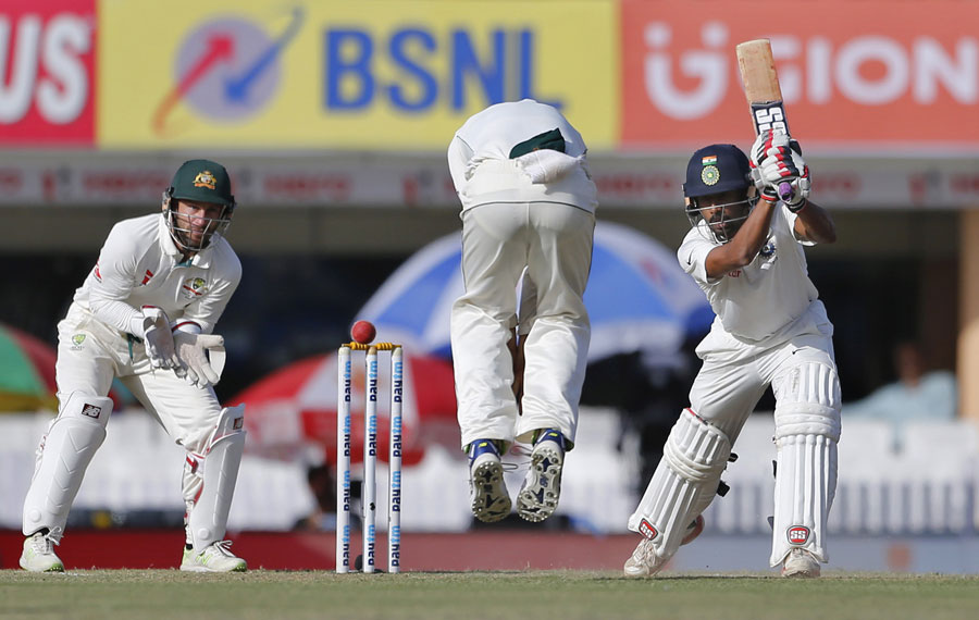 Wriddhiman Saha drives past silly point, India v Australia