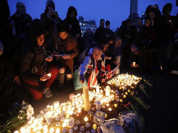 Londoners trickled into Trafalgar Square for a vigil