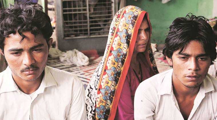 Victim Pehlu Khan's wife and sons