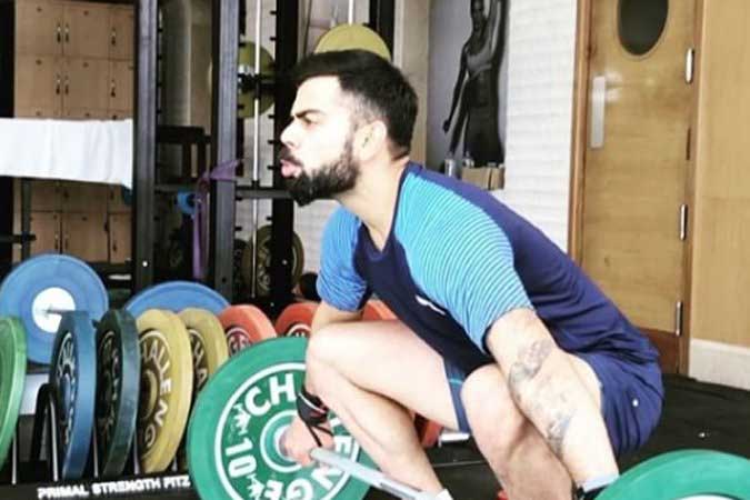 Virat Kohli doing a weightlifting clean and jerk drill