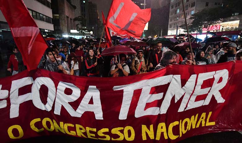 Demonstrators protest against Brazilian President Michel Temer in Sao Paulo