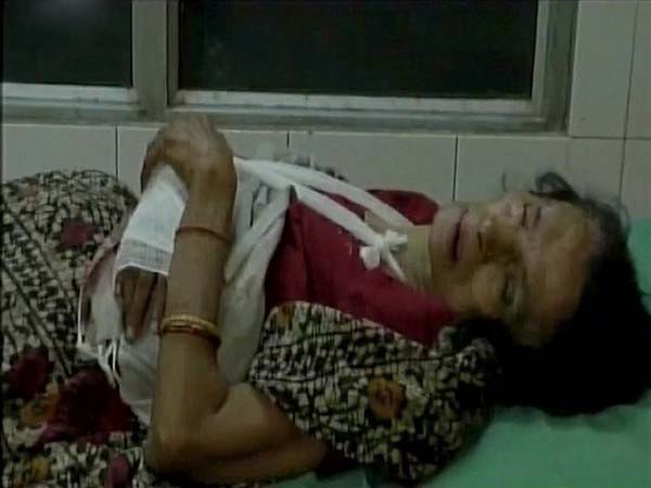 The victim, Prem Devi, was taken to the district hospital by her younger son