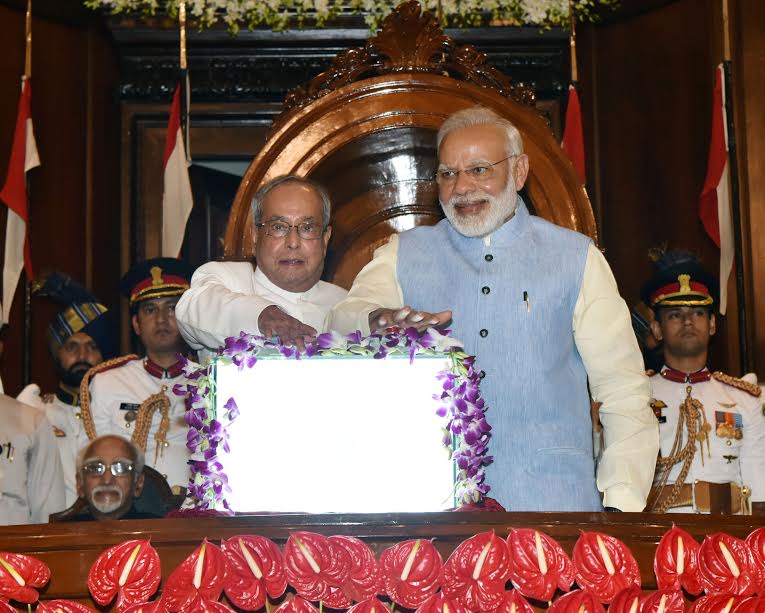 President Pranab Mukherjee, Prime Minister Narendra Modi press button to officially launch GST