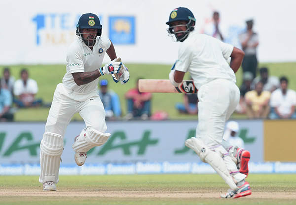  Shikhar Dhawan and Cheteshwar Pujara 