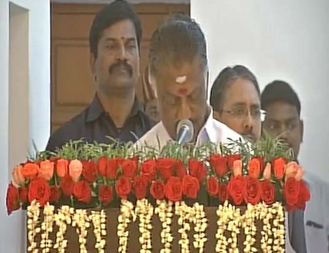 O. Panneerselvam swears-in as the Deputy Chief Minister at the Raj Bhavan in Chennai