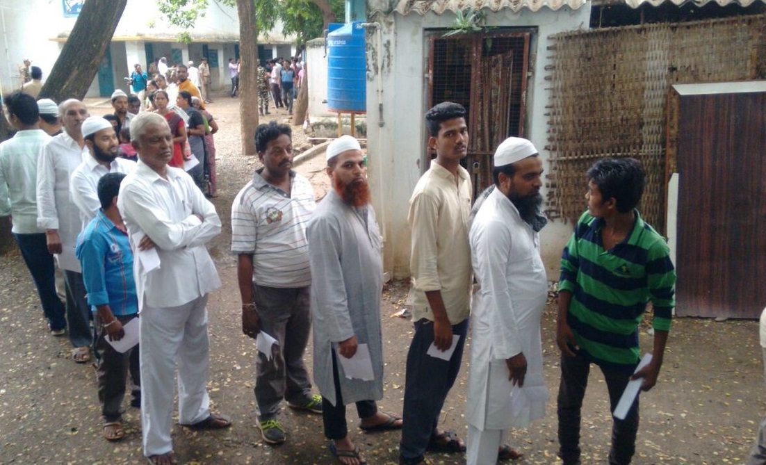 People wait in queue to cast their vote in Nandyal assembly by-polls