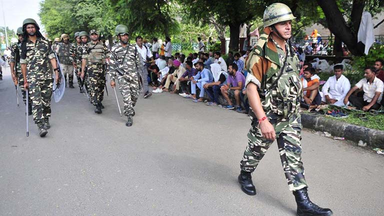 Security personnel conduct a flag march in Panchkula’s Sector 5 