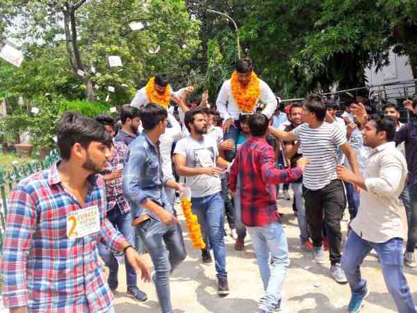 Student celebrating after winning in Delhi