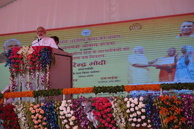 PM Modi addressing a public meeting after inaugurating a 'Pashu Arogya Mela'  