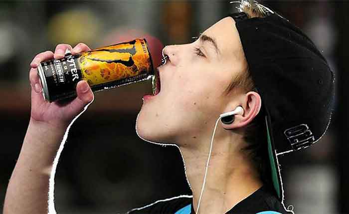 A Boy Drinking Energy Drinlk