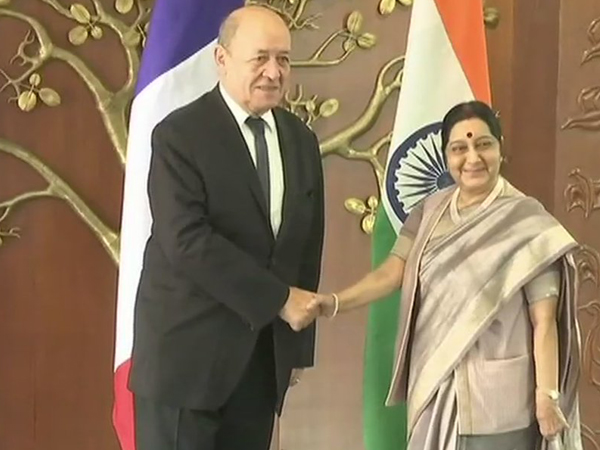 Sushma Swaraj  welcomes French Minister Jean-Yves Le Drian