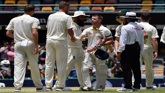 David Warner shakes hands with England's paceman Stuart Broad