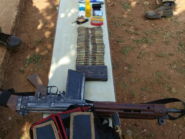 An improvised explosive device (IED), one self-loading rifle and ammunition