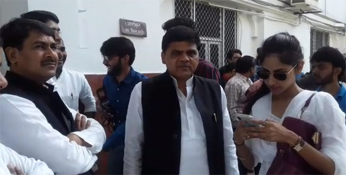 Party leaders standing outside the voting poll in Lucknow 