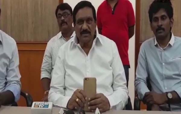 Andhra Pradesh Deputy Chief Minister K. E. Krishnamurthy addresses a press conference 