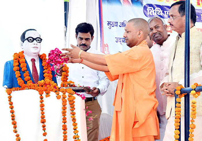 UP CM Yogi Adityanath floral tributes to B R Ambedkar