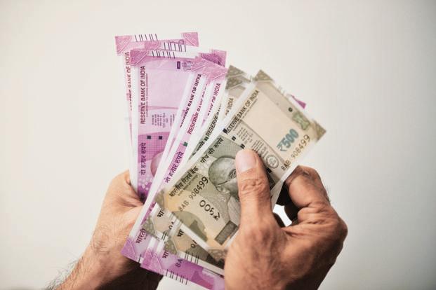 Rupee traded lower by 4 paise