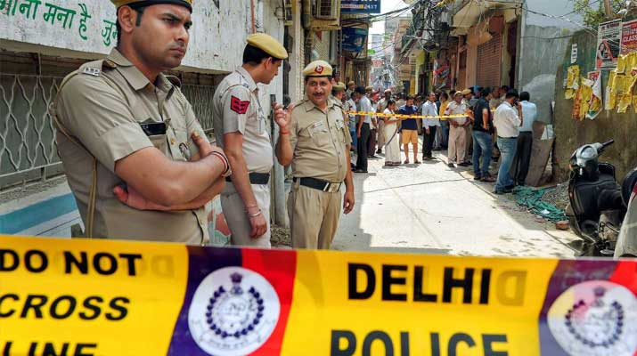 Dehi Police ops outside the house in Burari where 11 members of a family were found dead