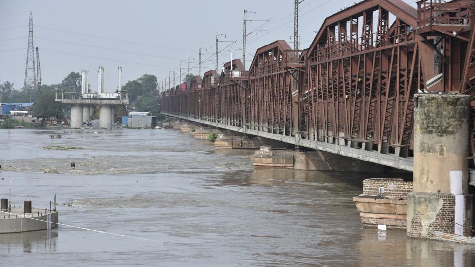 A view of the swollen Yamuna River near Old Iron Bridge in New Delhi on July 29