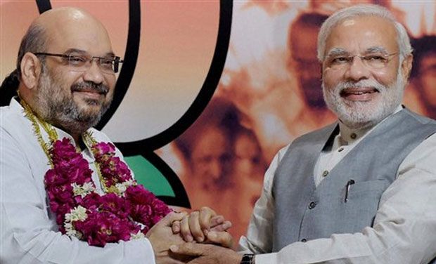 Prime Minister Narendra Modi greets BJP chief Amit Shah