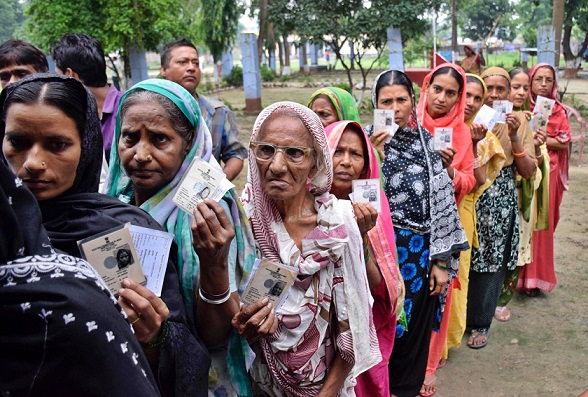 Voter stand in queue for casting their vote