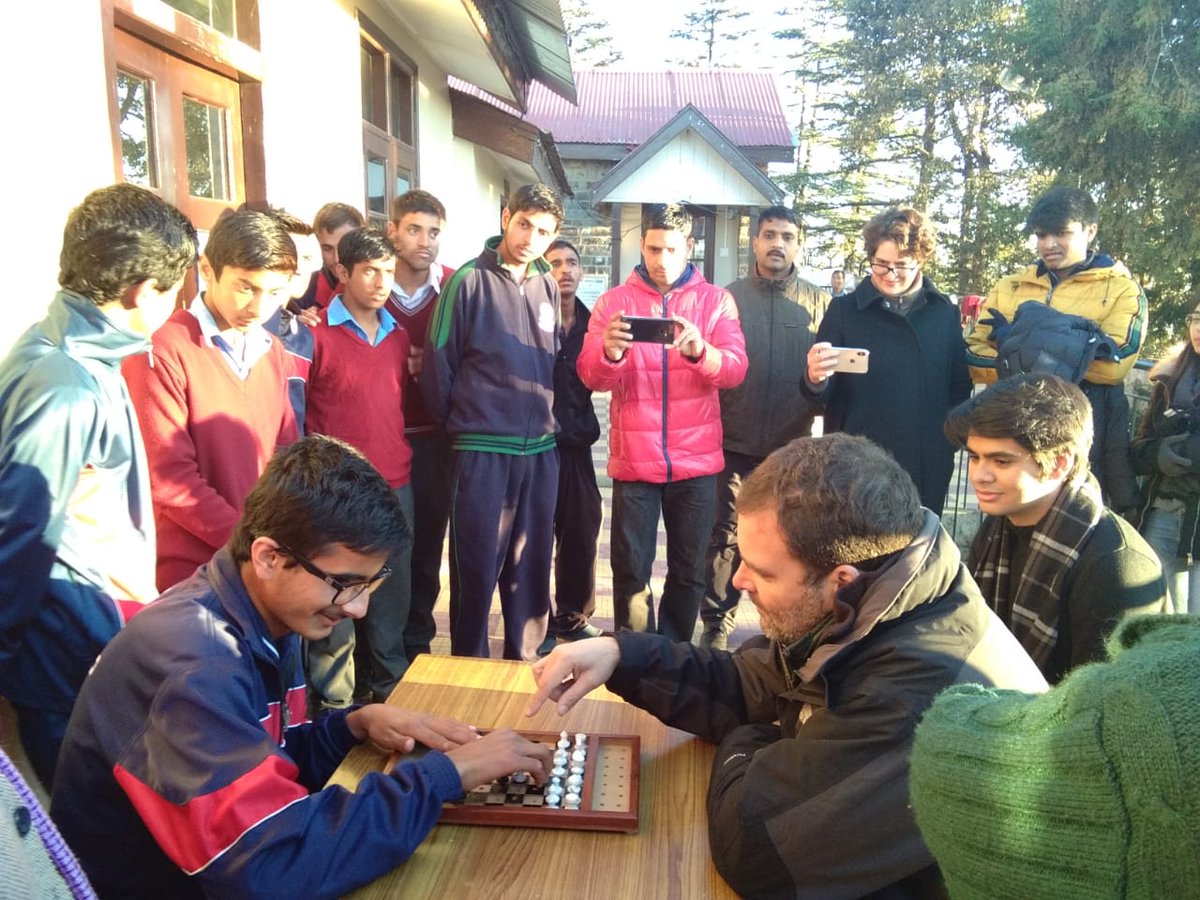 Rahul Gandhi engaged in a game of chess with specially-abled child