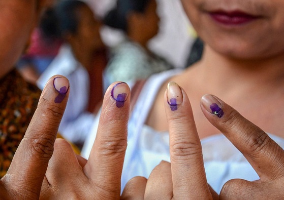 Voters cast their vote