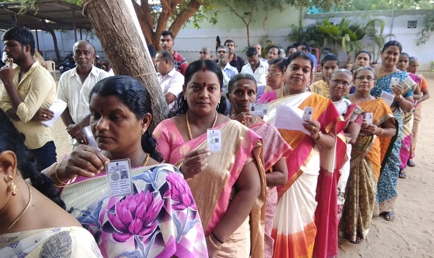 Voters line up outside polling booths in Tuticorin, Tamil Nadu