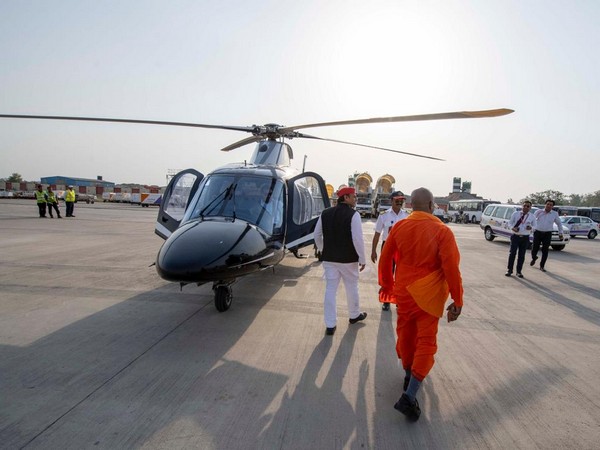 SP chief Akhilesh Yadav with 'baba' resembling UP CM Yogi Adityanath