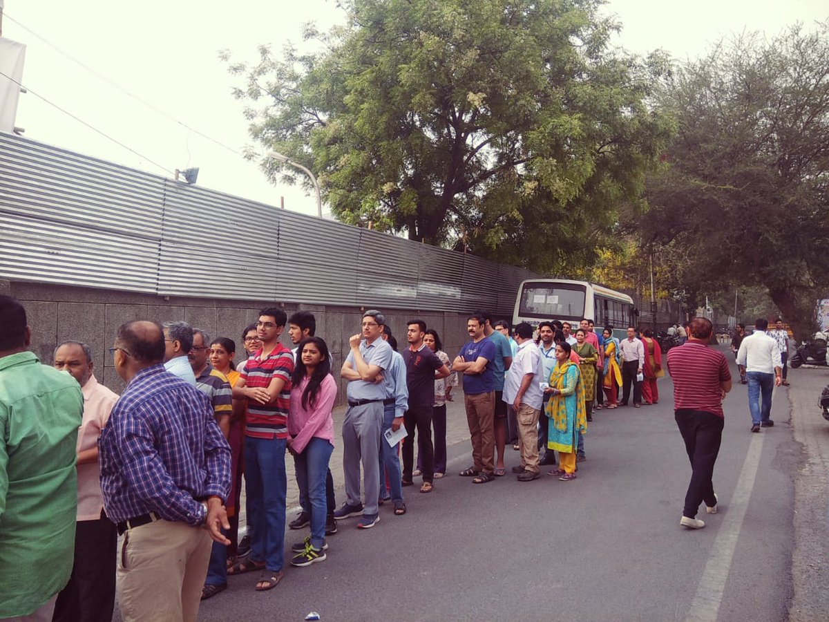 People standing in queue to cast vote in Delhi