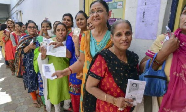 Voters line up outside polling booths