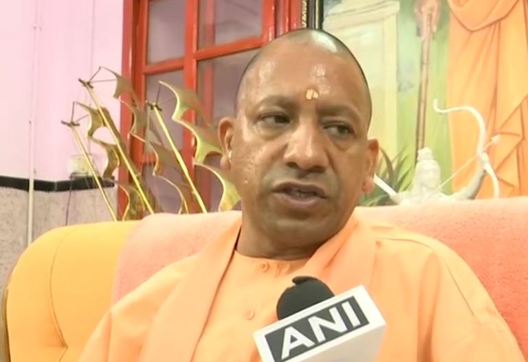 Uttar Pradesh Chief Minister Yogi Adityanath after casting his vote talking to media