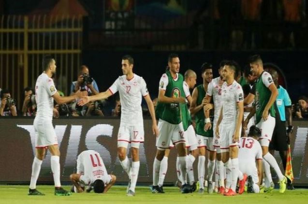 Tunisia players celebrating after scoring against Madagascar in the quarter-final match