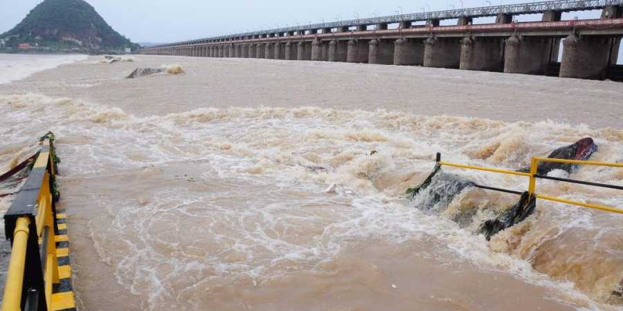 70 crest gates of prakasam barrage were lifted to discharge excess water on Wednesday