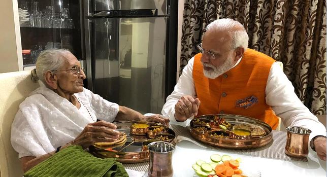 PM Modi having lunch with his mother at her residence in gandhinagar on Tuesday