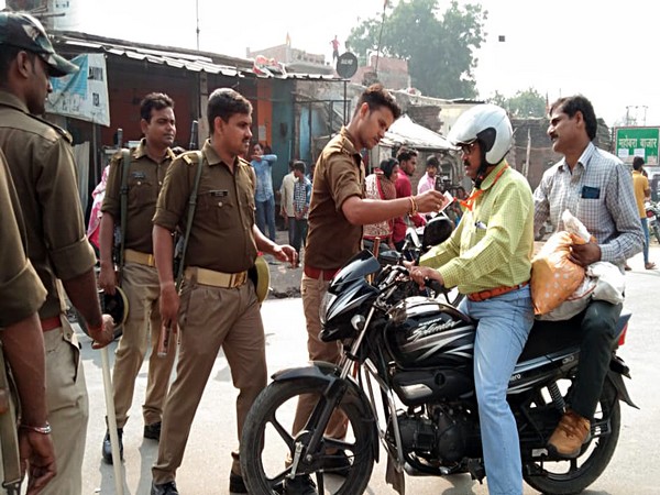 A policeman conducts checks as Section 144 imposed in Ayodhya