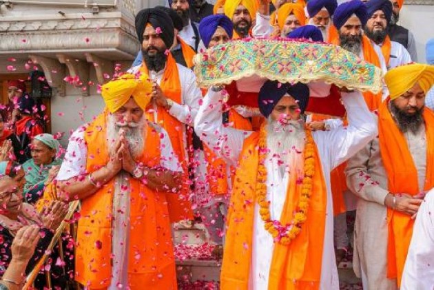 Devotees thronged the Gurudwara Harmandar Sahib