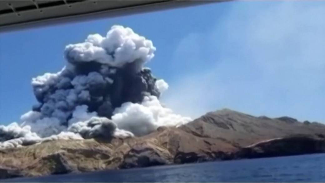 An aeriel view shows smoke billowing above the crater of Whakaari, also known as White Island, volcano as it erupts in New Zealand