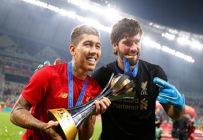 Liverpool's Roberto Firmino &  Alisson Becker