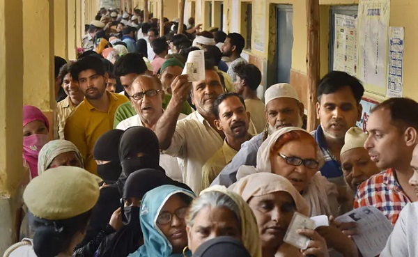 Voters line up outside polling booths