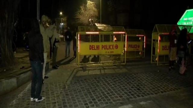 Security outside Atal Adarsh Bengali Balika Vidyalaya in Gol Market, to protect Strong Room' to store the Electronic Voting Machines used in Delhi Assembly Polls