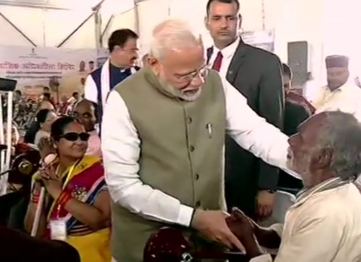 Prime Minister Narendra Modi at a distributive camp in Prayagraj on Saturday