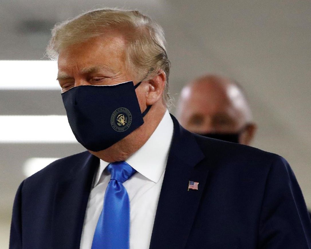 US President Trump wears mask in public for first time