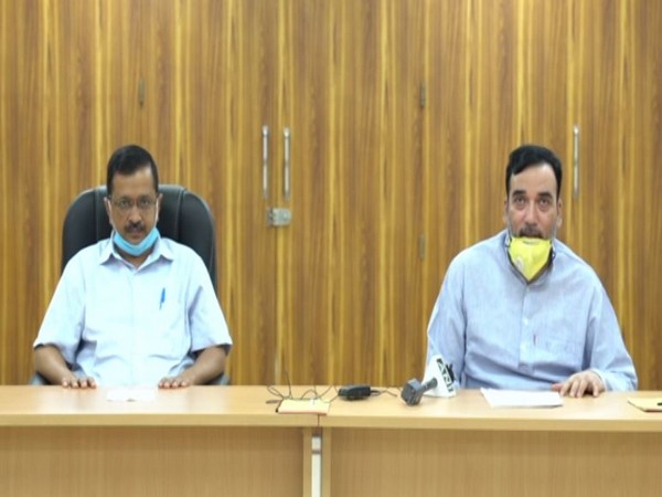 Delhi Chief Minister Arvind Kejriwal with Minister for Labour, Employment Gopal Rai at a press conference on Monday.