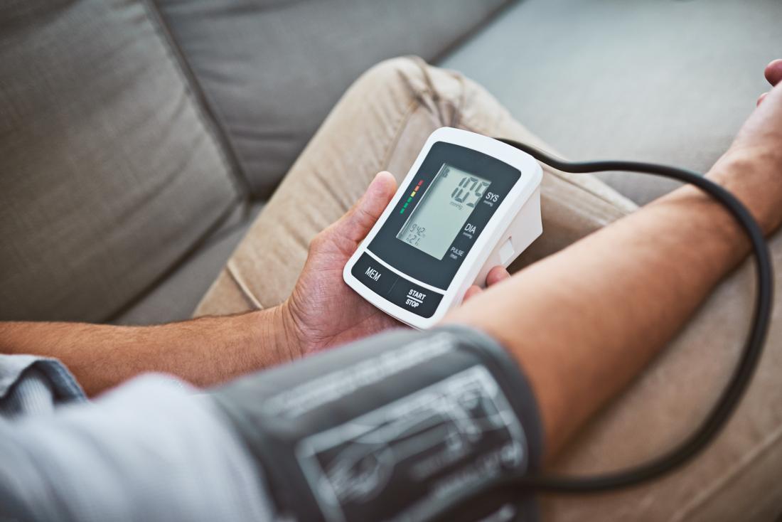 A man checking his Blood Pressure