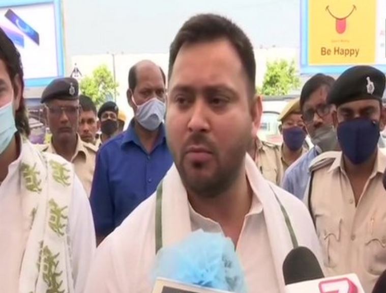 Rashtriya Janata Dal leader Tejashwi Yadav speaking to reporters on Friday