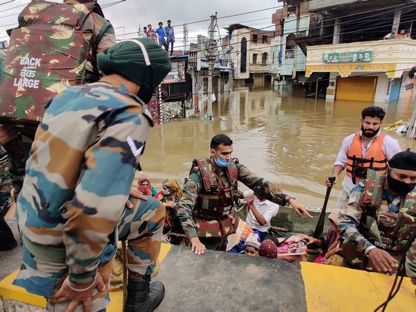 Indian Army flood relief teams carrying out rescue operations.