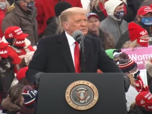 US President Donald Trump at a rally in Michigan