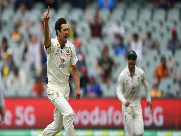 Mitchell Starc celebrates after dismissing Ajinkya Rahane